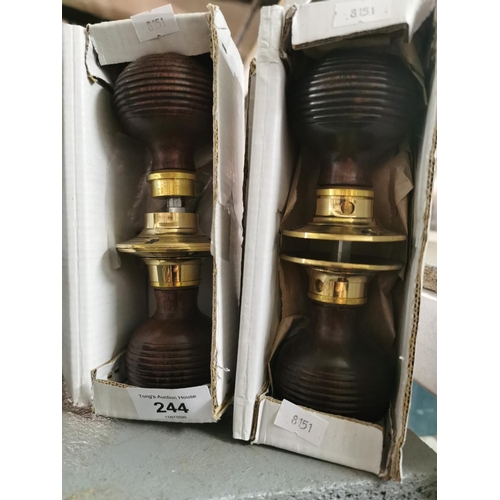 244 - Two pairs of wooden door knobs, new in box.