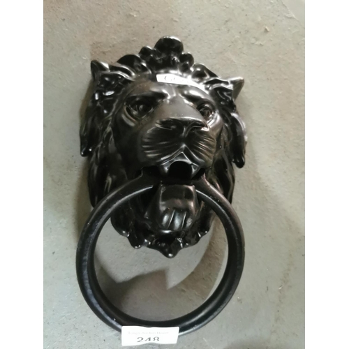 248 - Large black metal Lion door knocker.