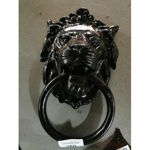 250 - Large iron Lion door locker.