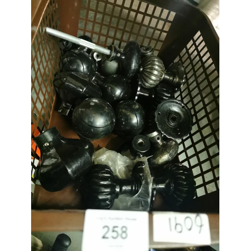 258 - Collection of metal door knobs.