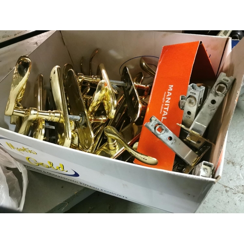 261 - Collection of brass door handles.