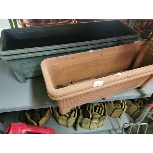 78 - 2 green and terracotta coloured plastic plant pots, 58 cm x 20 cm x 21 cm.