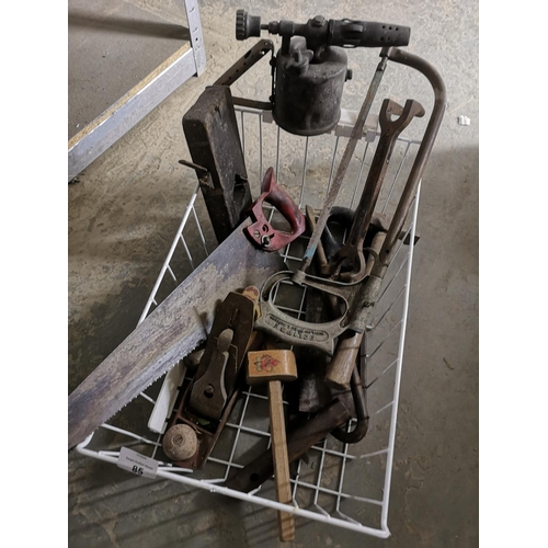 85 - Wire tray with paraffin blow lamp, acorn smoothing plane, saws and small tools