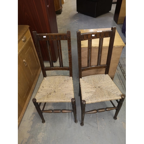 620 - Pair of woven seated vintage chairs.