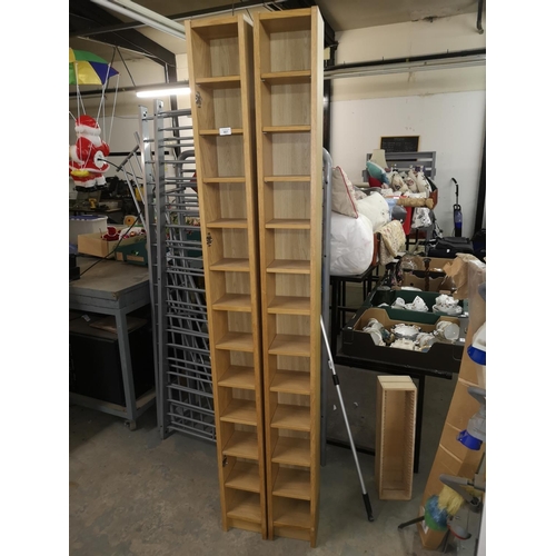 661 - xTwo tall CD racks,  x cm approx.