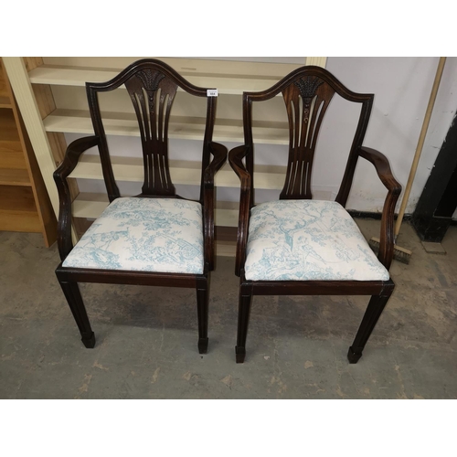 664 - Pair of early carver dining room chairs.