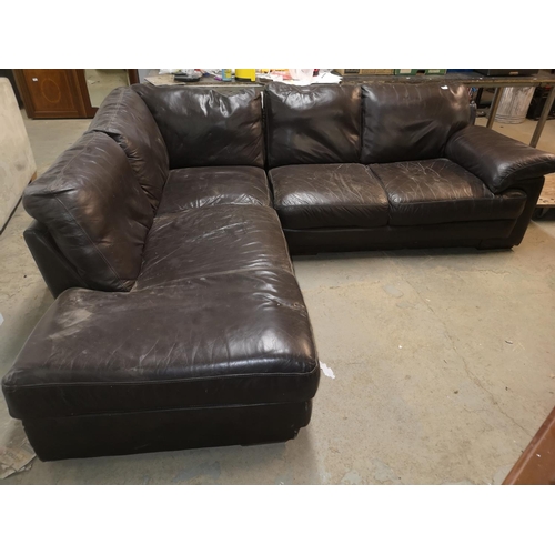 665 - Large brown leather corner sofa, 255 x 225 cm approx.