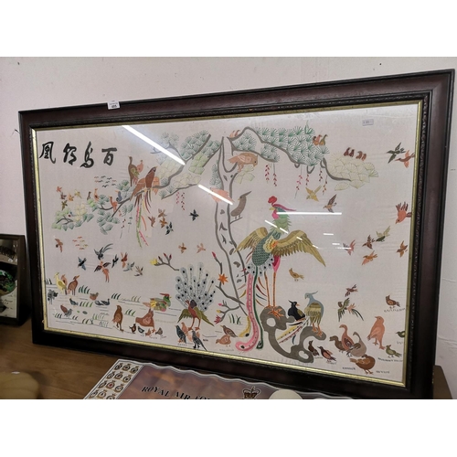 485 - Large wooden framed oriental style silk embroidered scene. 47