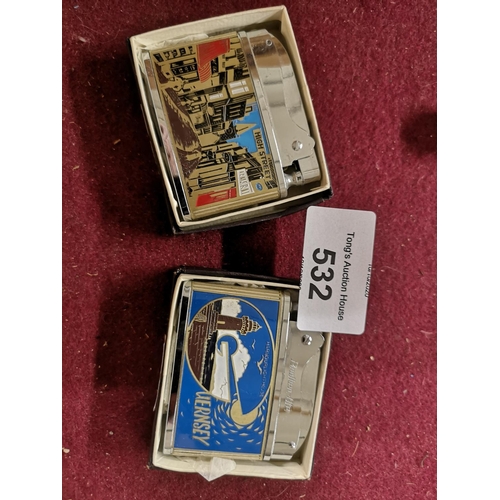 532 - 2 x Identical Brother Lighters, depicting Guernsey.