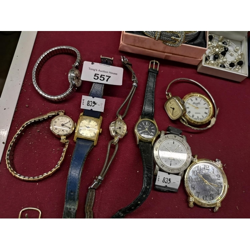 557 - Quantity of used and vintage watches, some without straps.