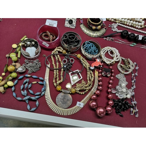 560 - Quantity of costume jewellery, to include necklaces/bangles and bracelets