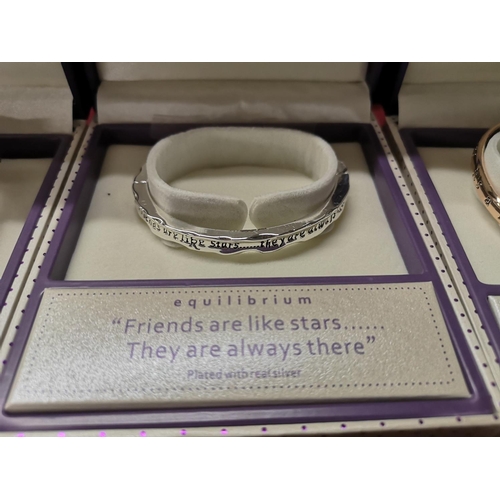 570 - Equilibrium new boxed bangle, engraved 