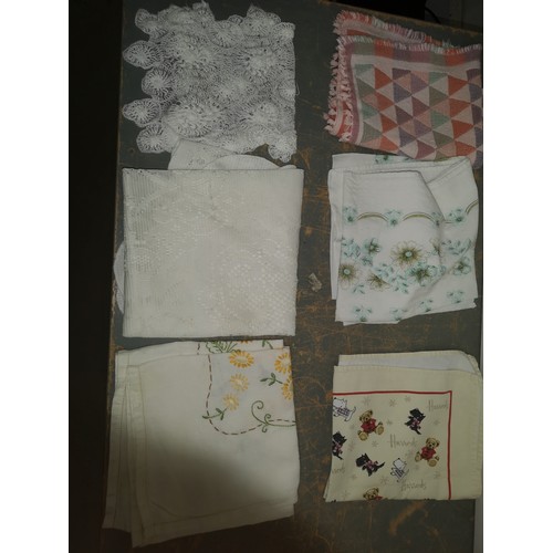 258 - Collection of table linen and curtains.