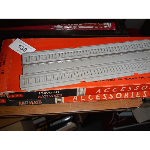 130 - Two boxed Playcraft railway accessories ramp section with rail