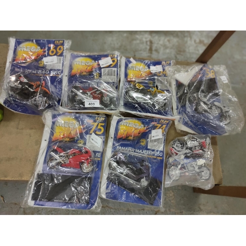 400 - Eight mega bikes, six in box, two loose but good condition.