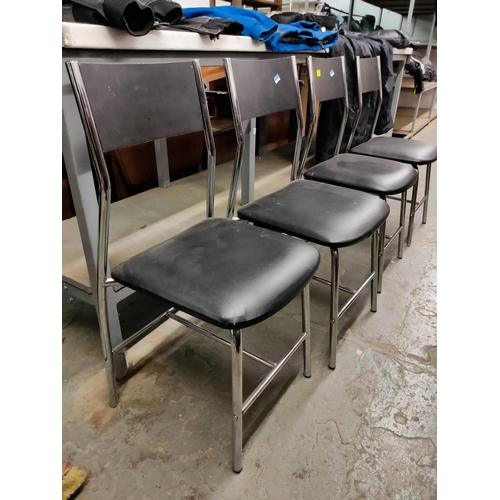 14 - 4 blackand chrome modern chairs