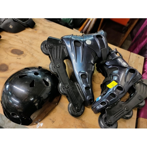 27 - pair of roller blades SP 150 and helmet ALL AS NEW