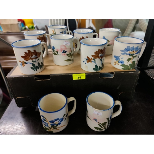 34 - collection of China mugs 10 in total