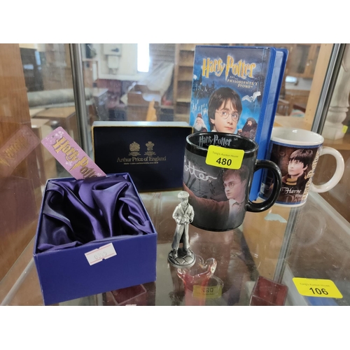 480 - Collection of Harry Potter items including mugs, VHS Video tape and Arthur Price Boxed ornament