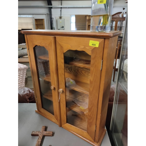 486 - Wooden display cabinet with shelves. Approx 60x50x12cm