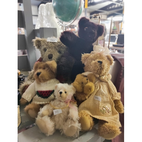 753 - A collection of five vintage teddy bears