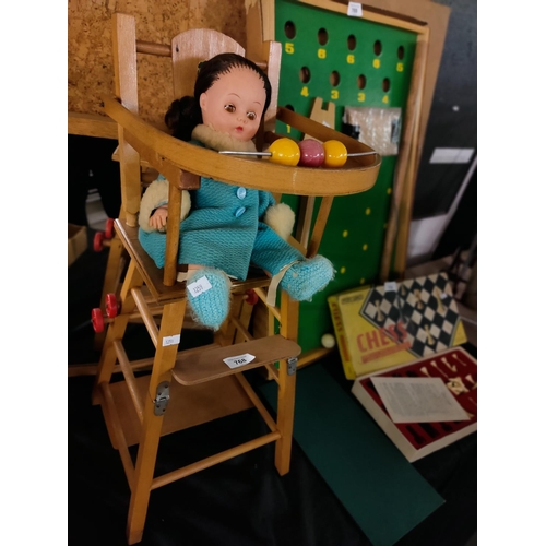 768 - Vintage doll with vintage dolls highchair