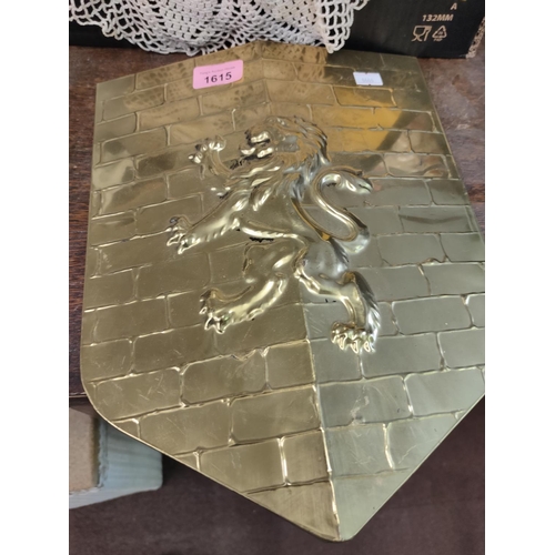 1615 - Gold coloured Lion shield wall hanging