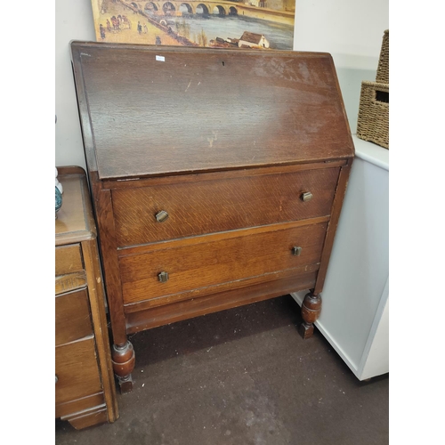 1641 - Wooden two drawer bureau.