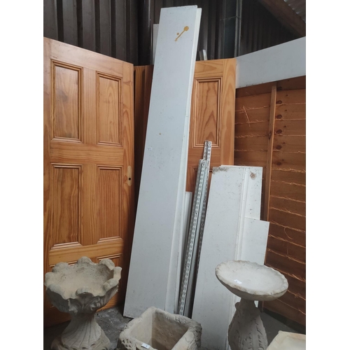 1 - A large quantity of white wooden shelving metal brackets