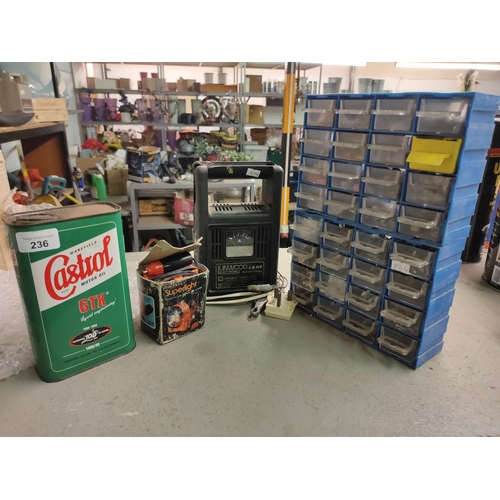 236 - CAR BATTREY CHARGER ALSO A LIGHT AND A LITRE OF CASTROL GTX OIL CAN AND SMALL TOTE BIN WITH CONTENTS