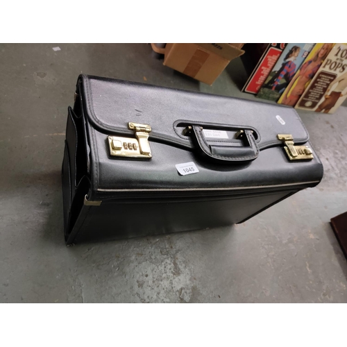 1045 - A vintage leather briefcase and a modern lockable filing case