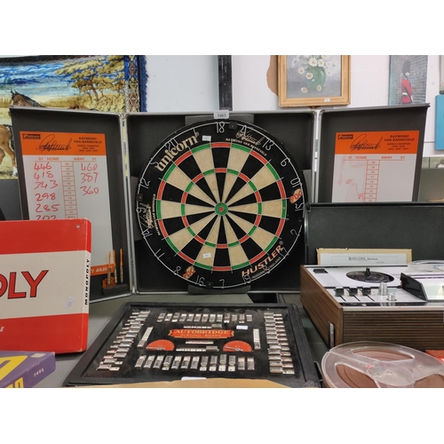 1063 - A modern Unicorn dart board in case