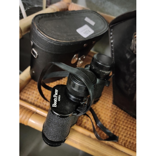 1074 - A pair of Boots pacer binoculars and case