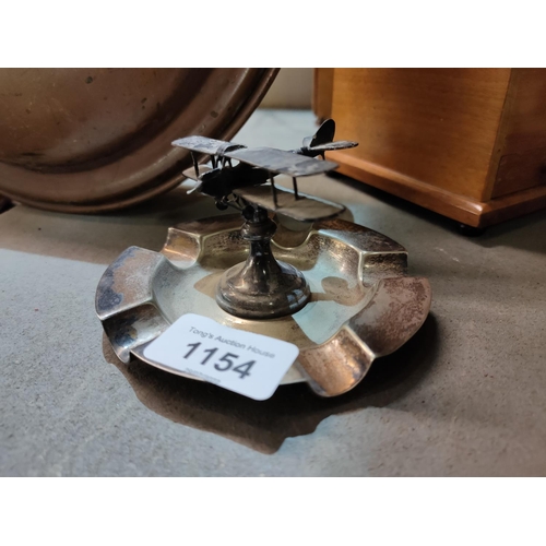 1154 - Silver plate Second World War ashtray with aeroplane