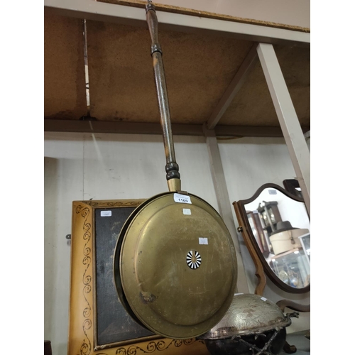 1169 - An old brass bed warmer pan