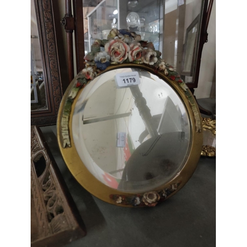 1179 - A lovely little circular dressing table mirror with floral detail on the frame