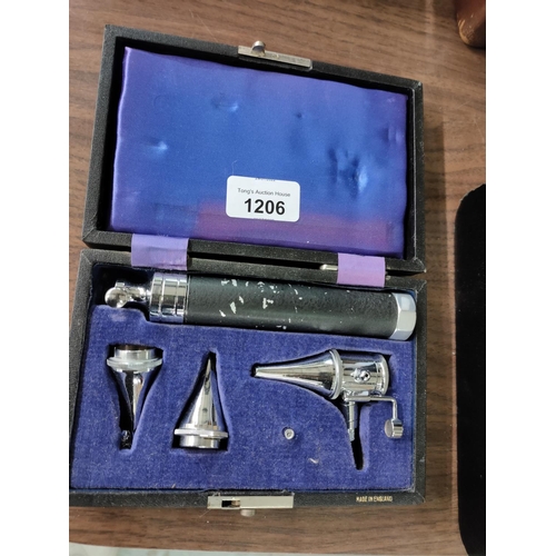 1206 - A vintage Auriscope in case