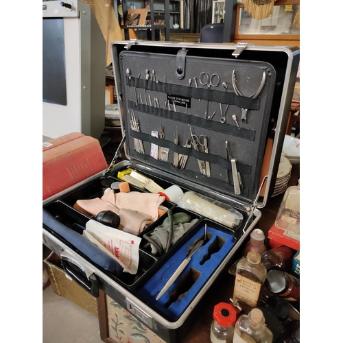 1213 - A briefcase with medical contents, including very large collection of instruments and dressings. Ama... 