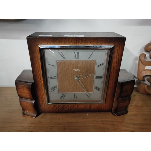 1254 - An oak 8 day mantle clock by Smiths