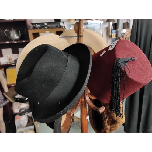 1283 - A vintage mans Fez hat and a Dunn & Co black hat