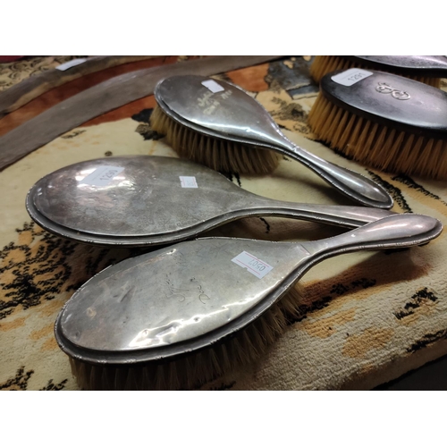 1290 - A Silver hallmarked Birmingham hairbrush and mirror dressing table set, signed Sybil 1920