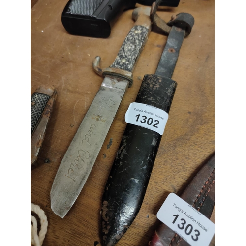 1302 - A vintage navel sheath knife in WW2