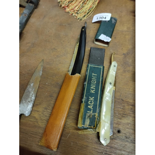 1304 - A collection of two vintage cut throat razors