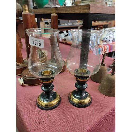 1310 - A pair of glass candle holders