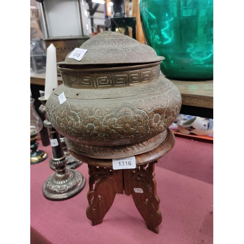 1315 - An old large Indian influenced copper and brass decorative lidded pot