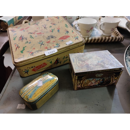 1324 - A collection of three vintage tins, some with sewing items inside