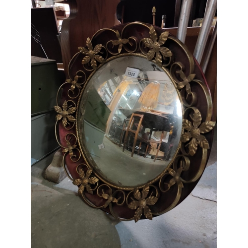 1325 - A retro wall hanging mirror with brass surround