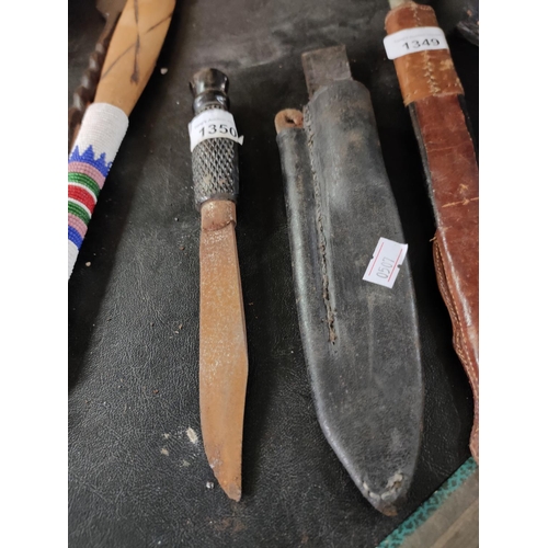 1350 - A vintage naval dagger in sheath