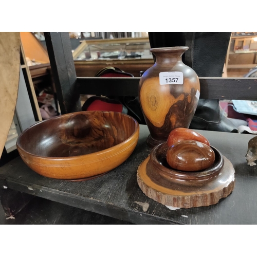 1357 - A collection of treen items, including a bowl and two wooden eggs