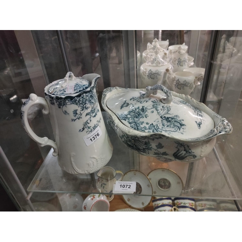 1376 - Two pieces of blue and white pottery, a lidded jug and a tureen